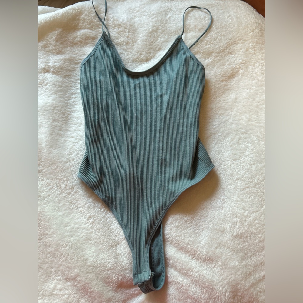Body suit. Sucks you in but not in an uncomfortable way.